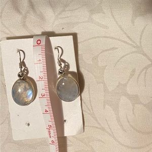 Brand new pair of Sterling Silver Moon stone earrings.